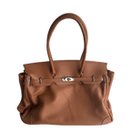 chestnut brown leather firkin bag front view